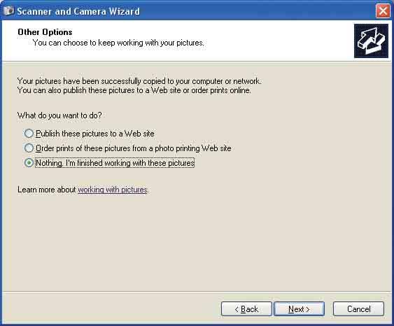 Beelden kopiëren naar de computer 5 Selecteer het keuzerondje naast [Nothing. I'm finished working with these pictures] en klik op [Next].