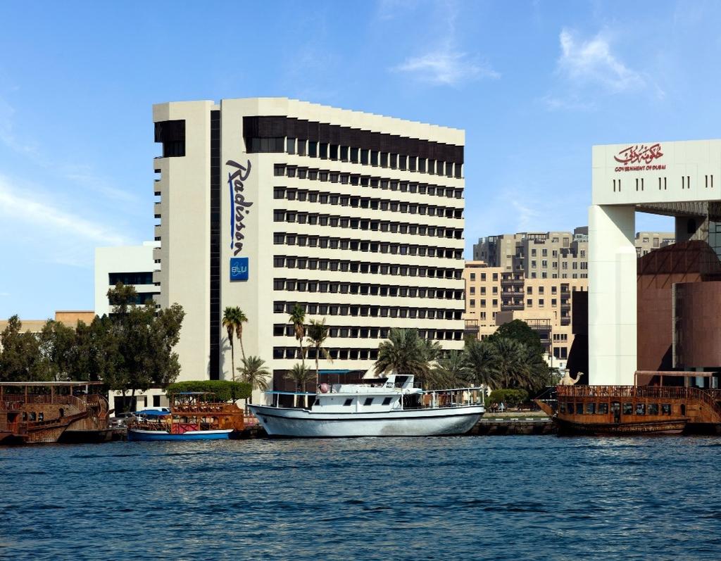 . uw hotel Radisson Blu Hotel Dubai Creek 5* Hilton Hotel Doha Perfect gelegen aan de oude