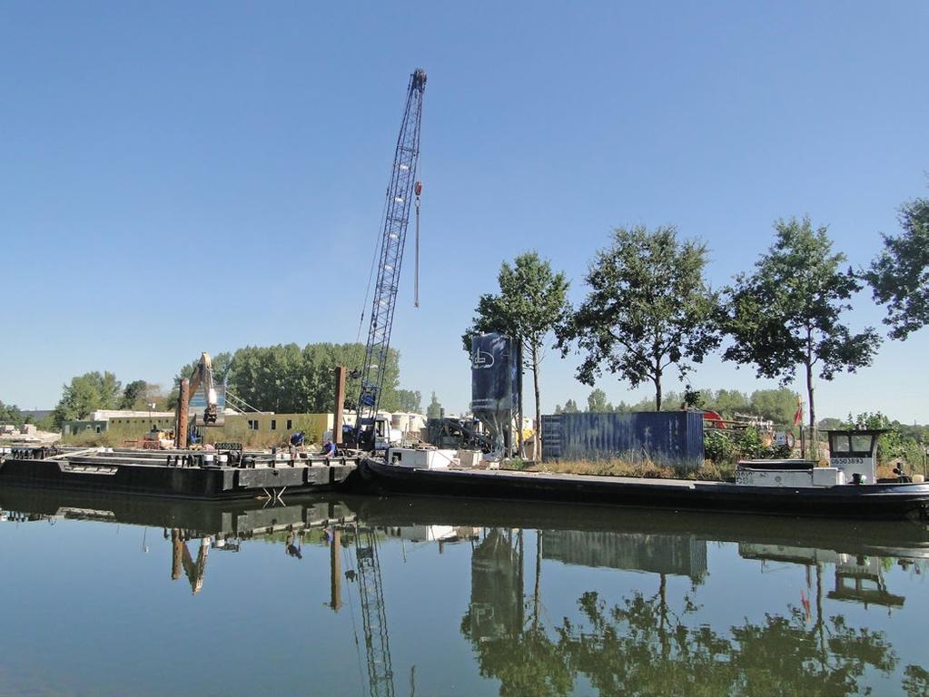 Drie containerschepen verzorgen het transport van de mout naar de haven van Antwerpen. EcoWerf is een intergemeentelijke vereniging met 27 vennoten (totaal voor 390.000 inwoners).