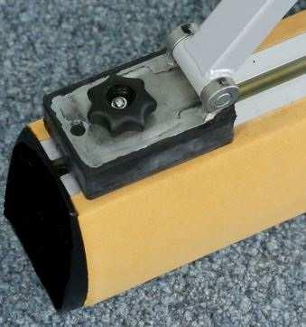 Position the feet on the sliding bolts within the rail and make sure the pen on the damping block is placed