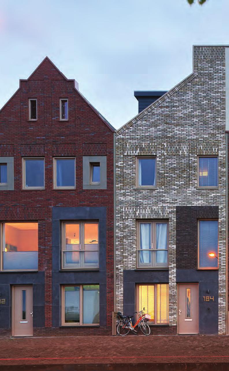 74 woningen en 5 appartementen Ebbingekwartier, Groningen BASE-ISOLATION OP EEN PARKEERGARAGEDAK De wijk Ebbingekwartier op het voormalige CiBo- Ga-terrein in Groningen is uitgebreid met 74 woningen