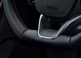 bovengrille, bumpers en zijplaten Achterspoiler in carrosseriekleur Interieurkenmerken extra t.o.v. Trend Sportstoelen