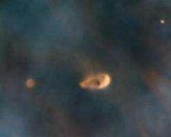 nieuwe sterren die geboren worden in de Trifidnevel (links)