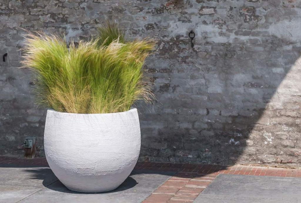 earth fiberstone Bring the beauty of mother earth into any interior or garden with the earth collection of pottery pots.