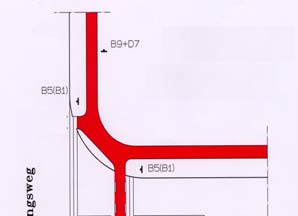 kan opstellen tussen rijweg en fietspad; - de overstekende