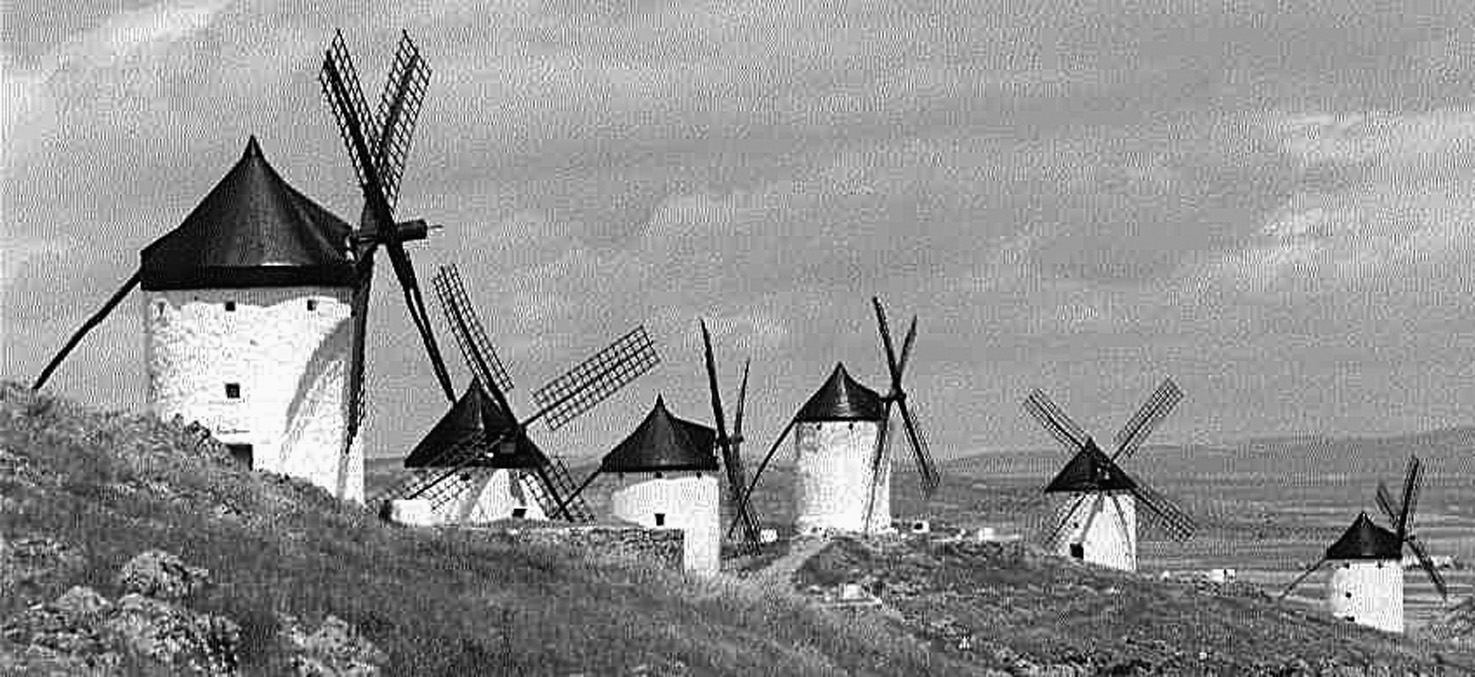 In Consuegra, zeventig kilometer bezuiden Toledo, staan midden in dat landschap de gereconstrueerde windmolens waartegen Cervantes Don Quichot liet vechten in zijn gelijknamige meesterwerk, symbolen
