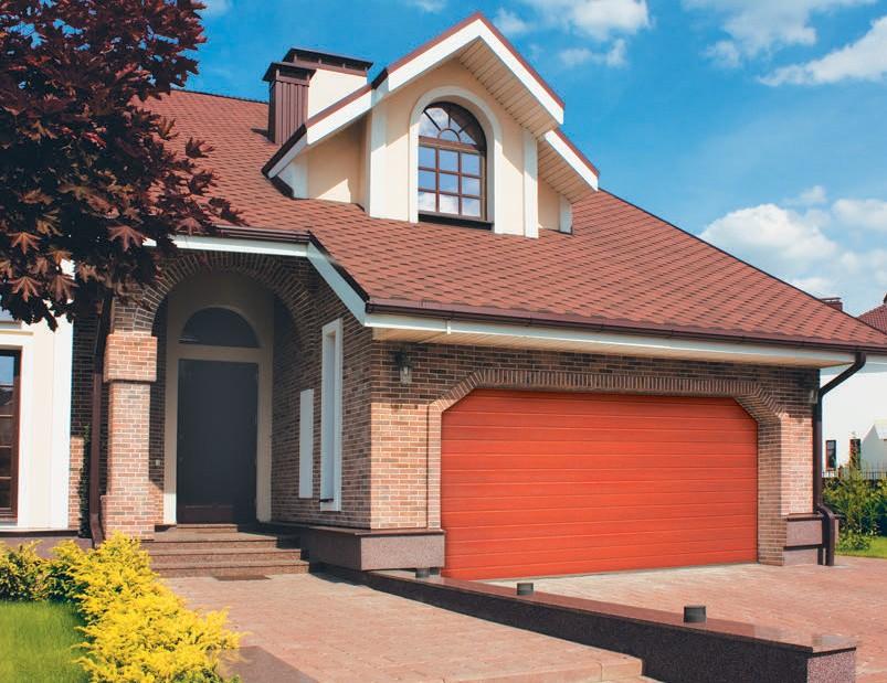 Garage sectionaaldeuren met decoratieve afwerking "Golden Oak", "Dark Oak" en "Cherry" worden afgestemd op de klassieke architectuur.