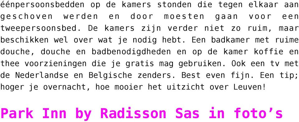 Een badkamer met ruime douche, douche en badbenodigdheden en op de kamer koffie en thee voorzieningen die je gratis mag