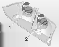 Verzorging van de auto 205 8. Schakel de ontsteking in en kijk of alle lampen werken. Extra achterlichten in achterklepframe 1. Open de achterklep. 2. Maak de kap in het zijbekledingspaneel los en verwijder deze.