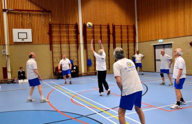 Foto s van de organisatie en het volleybal team van De