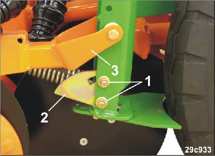 Instellingen Grotere zaaischijfdruk instellen 1. Zet stuurventiel 2 in de zweefstand. 2. Trek de handrem aan, schakel de motor van de tractor uit en verwijder de contactsleutel. 3. Steek de pen (Afb.