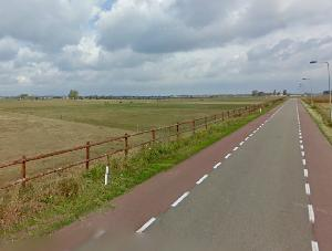 bouwmaterialen (geschilderde baksteen, vanouds in de streek gebruikte natuursteen, rode of gesmoorde pannen en