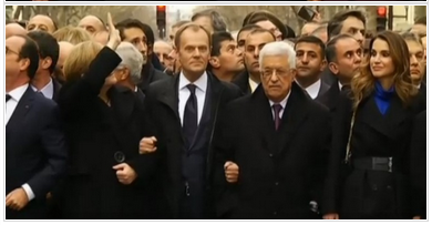 Bemerk de palestijnse Fatah-jodenslachter Mahmoed Abbas die op de eerste rij loopt terwijl de ex DDR-communiste Merkel de menigte toezwaait!