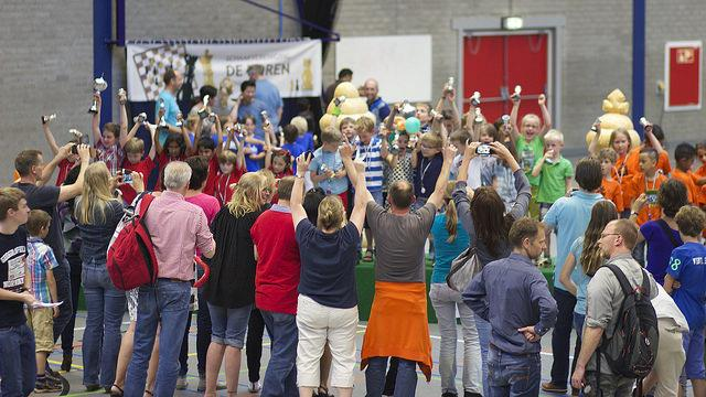 NK schaken voor schoolteams basisonderwijs 2015 in Amsterdam De jeugdleider van de Schaakbond Groot Amsterdam (SGA), Tigran Spaan, meldde zich in het najaar van 2014 bij de KNSB dat zij als SGA