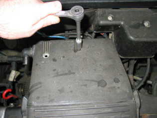 Insert the end of the 90 0 plastic vent adaptor into the large vent hole in the base of the new air filter. (Fig.13) 14.