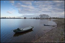 invoerende lijn Diepte Zorg voor een beeldelement (een hek of een koe bijvoorbeeld) op de voorgrond. Dat geeft diepte aan de foto. Een invoerende lijn van een pad of rivier zorgt ook voor diepte.