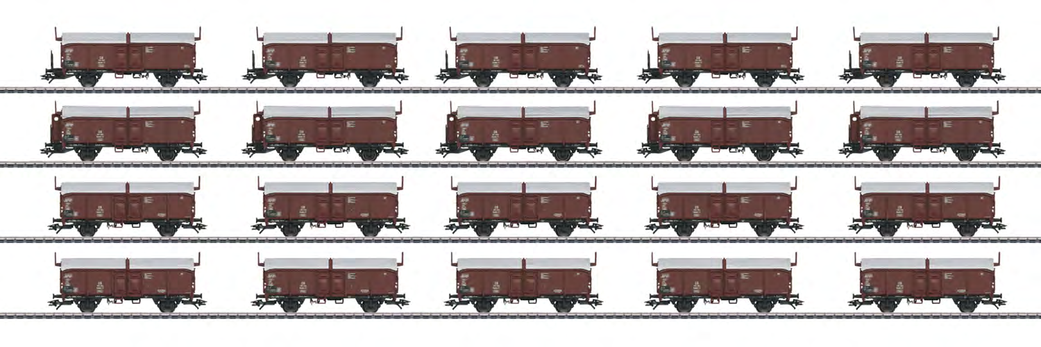 00765 Display met 20 goederenwagens Kmmks 51. Voorbeeld: Verschillende schuifdakwagens van het type Kmmks 51 van de Deutsche Bundesbahn (DB).