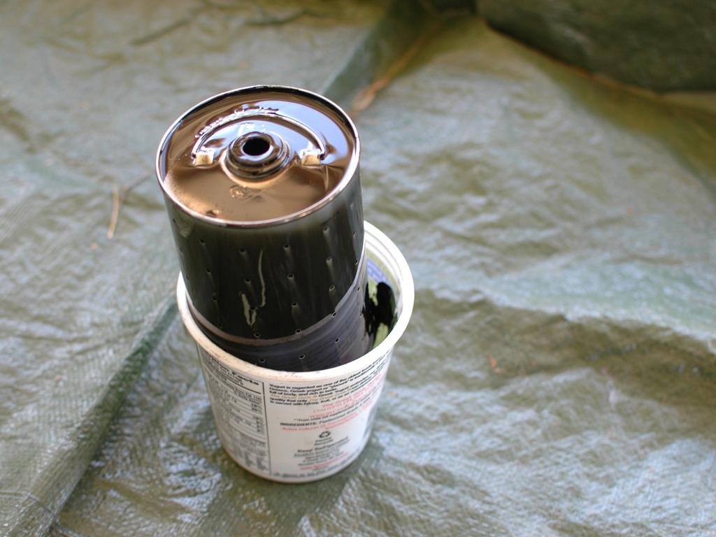 Stap 7 Zorg ervoor dat de olie filter in een geschikte container