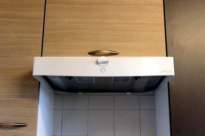 De wasemkap Uw keuken heeft over een motorloze wasemkap.