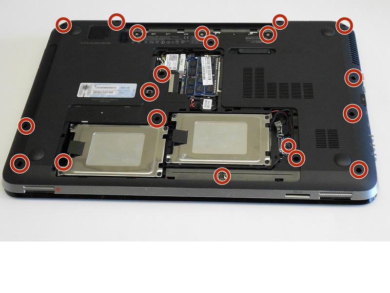 Stap 4 Verwijder voorzichtig alle twintig schroeven van de externe laptopcase. Verwijder de acht Phillips PM2.5x5.