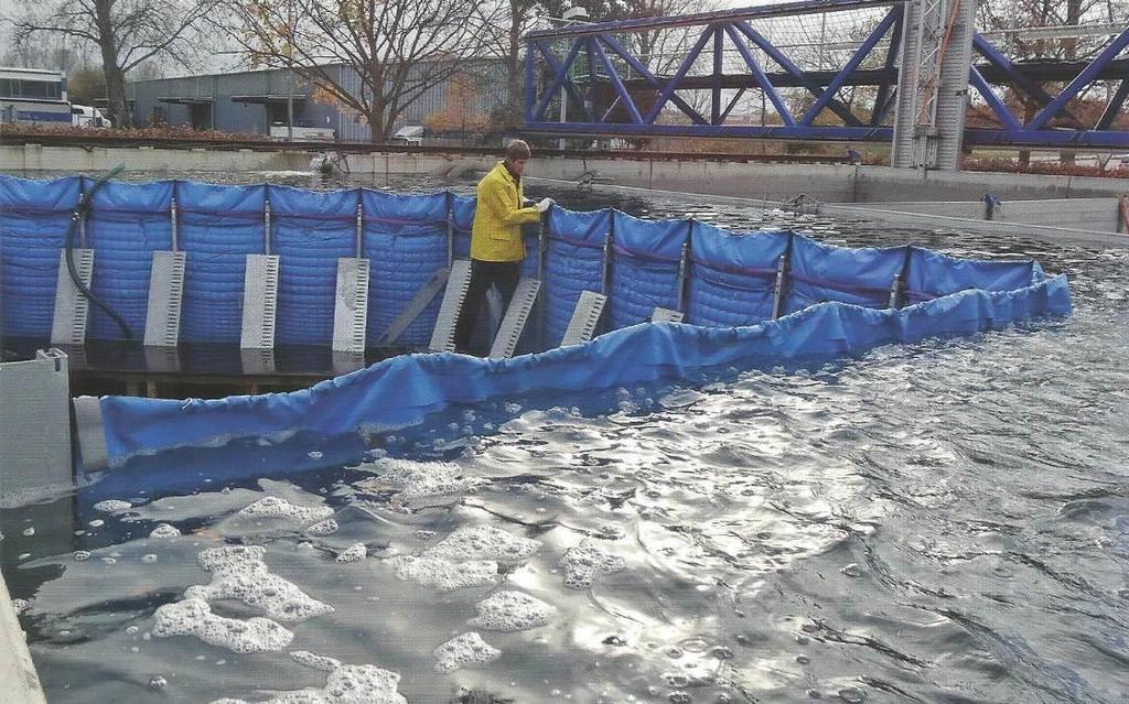 onderdelen. De kleppen die de waterkering in de normale situatie afdekken, dienen in de geopende toestand als schoren voor de staanders (zie figuur B-2).