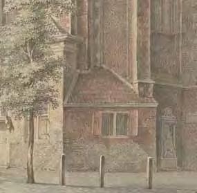 Twee verschillende stadspompen tegen de doopkapel van de Pieterskerk.