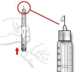 E. Druk de doseerknop volledig in. Controleer of er insuline uit de punt van de naald komt. Het kan nodig zijn de veiligheidstest een aantal malen te herhalen voordat u de insuline ziet.