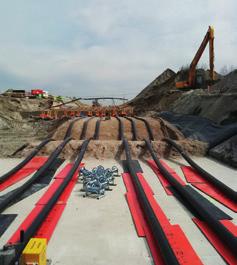 term wiskunde? de gebouwen van het Stevin-hoogspanningsstation een groen dak én de vorm van een schip hebben? Ze zijn bekleed met lariks hout dat ook in de scheepsbouw wordt gebruikt.