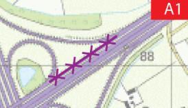De westelijke rijbaan van de A50 bestaat binnen het knooppunt Beekbergen na deze tapersamenvoeging uit drie rijstroken en een vluchtstrook.
