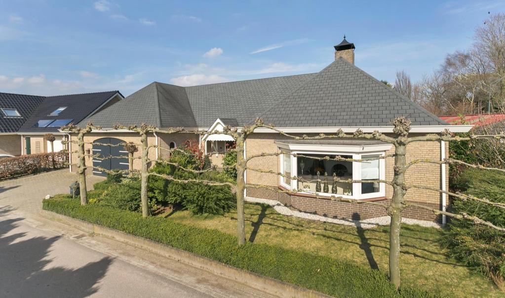 Luxueuze vrijstaande woning met royale inpandige garage en vrijstaande schuur in het buitengebied van Oud Gastel.