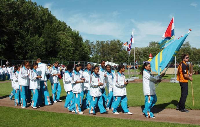 Kon i n k r i j k s s p e l e n op Ar u b a De Arubaanse sporters tijdens de sluiting van de Koninkrijksspelen 2007 in Den Haag Dit jaar is Aruba gastheer voor de Koninkrijksspelen.