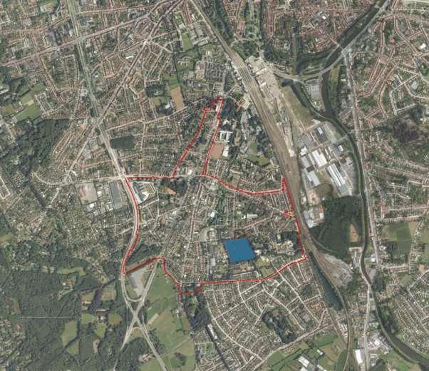 Het plangebied is gelegen in deelgemeente Sint-Michiels. De centrale as van het plangebied is de Koning Albert I-laan, tussen de Veldstraat en de Tillegemstraat.
