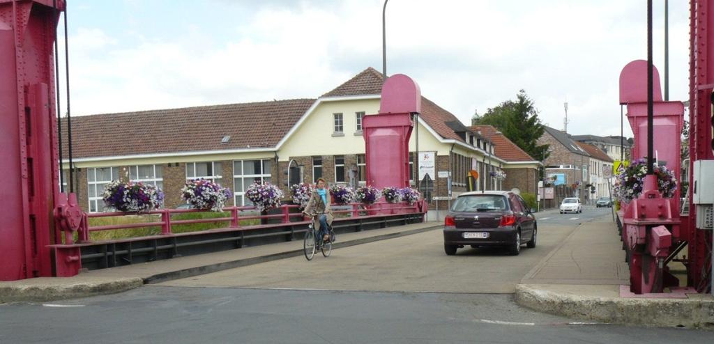 Om de bewegingsinrichting van grote hefbruggen niet te