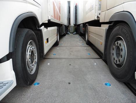 chauffeurs bij het inparkeren en het volgen van de juiste route.