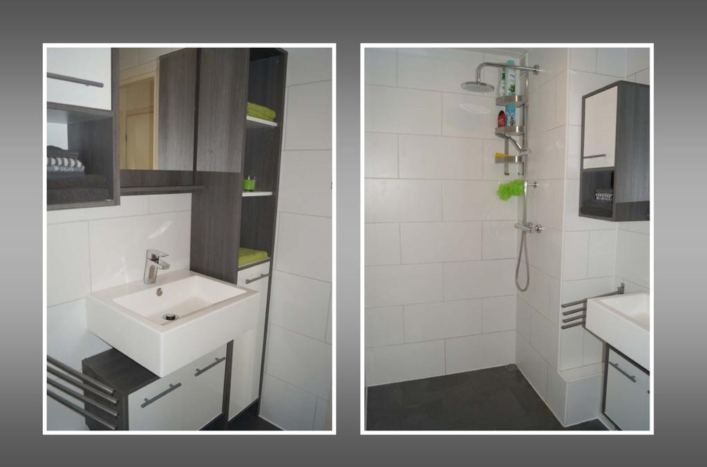 Indeling Badkamer : Moderne badkamer, welke in 2016 is vernieuwd, voorzien van een mooie (regen) douche, en een moderne wastafel met diverse kastjes.