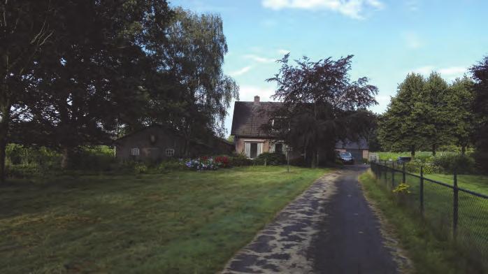 Zicht vanuit Delst op de bestaande woning. Zicht vanuit het voorerf naar het zuiden.