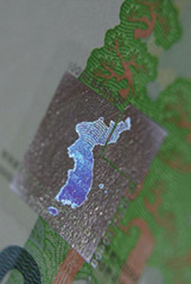 4 Lesbrief Korea in het nieuws Docenteninformatie Foto 1 Hologram van heel Korea op een Zuid- Koreaans bankbiljet van 1. won Inhoud In april 213 beheersten Noord- en Zuid-Korea het nieuws.