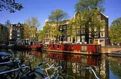 Werelderfgoed sinds 2010 14 km gracht, 80 bruggen omvat 8000 monumenten, grachtengordel van amsterdam Wonder van water waaronder het Anne Frankhuis en Huis BArtolotti van Hendrick de Keyser De