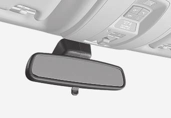 Het hendeltje is niet aanwezig op spiegels met autodimfunctie. 03 G021341 Gebruik de elektrische verwarming om de achterruit en de buitenspiegels te ontwasemen en te ontdooien.