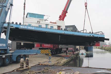 De Binnenvaartkrant 3 Schultz: Watertruck is juist goed voor kleine binnenvaart Minister Schultz van Haegen juicht het Vlaamse project Watertruck+ toe.