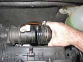 Twist & remove the intake hose / scoop from the side air deflector. (Fig. 6) 7.