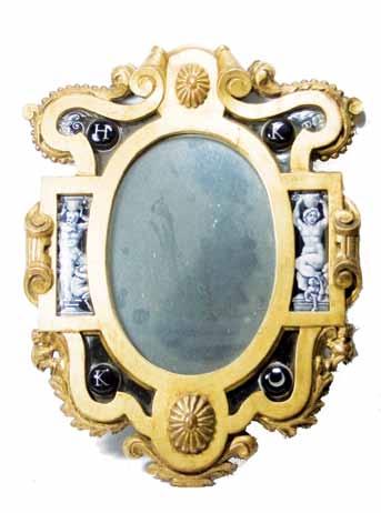 1000-1200 26 115 An oval mirror in agilt wood shaped frame with Limoge