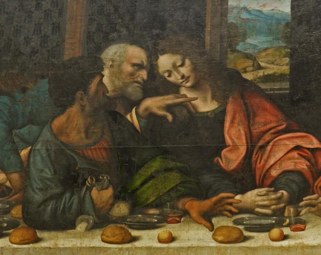 Judas Iskariot vormt samen met Petrus en Johannes een andere groep van drie. Judas zit in de schaduw en kijkt teruggetrokken na het horen van de onthulling van zijn plan.