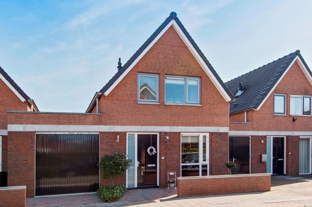 Opijnen, Polingstraat 13 Levensloopbestendig huis met garage Subliem woonhuis met optimaal wooncomfort!