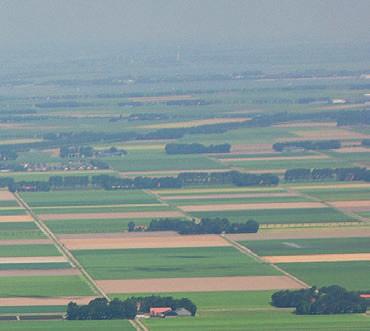 Een lange termijnoplossing voor het bodemdalingsgebied Bodemdaling in onze polder is een natuurlijk proces.
