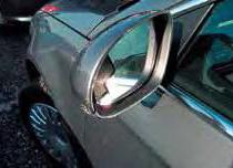 Buitenspiegels en antennes Reclame op voertuigen Gebarsten glas of een gebarsten of beschadigde behuizing;