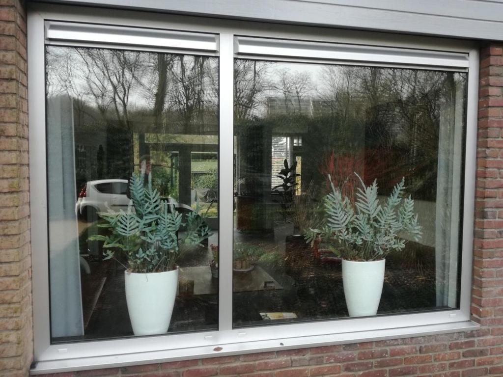 @3: Materiaal en kleur van de kozijnen Omdat het huis (en de overige huizen) aan de Spechtlaan zijn uitgevoerd met aluminium