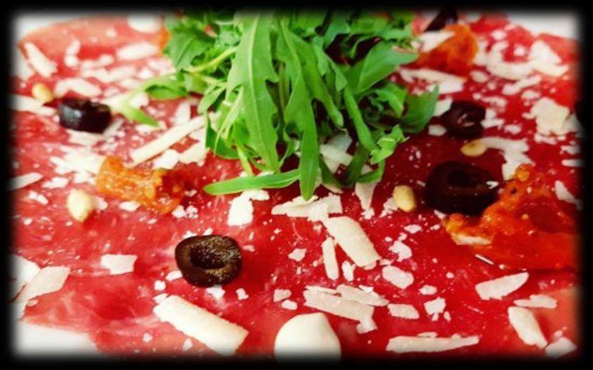 Voorgerechten: Rundercarpaccio 10.50 Met een frisse salade, Parmezaanse kaas en zonnebloempitten Carpaccio vom Rind mit Salat, Parmesan und Sonnenblumenkerne Camembert uit de oven 11.