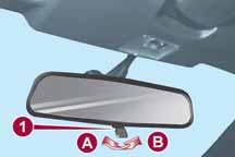 DAG/ NACHTBINNENSPIEGEL 39) Verstellen van de achteruitkijkspiegel Verstel voordat u gaat rijden de achteruitkijkspiegel fig.
