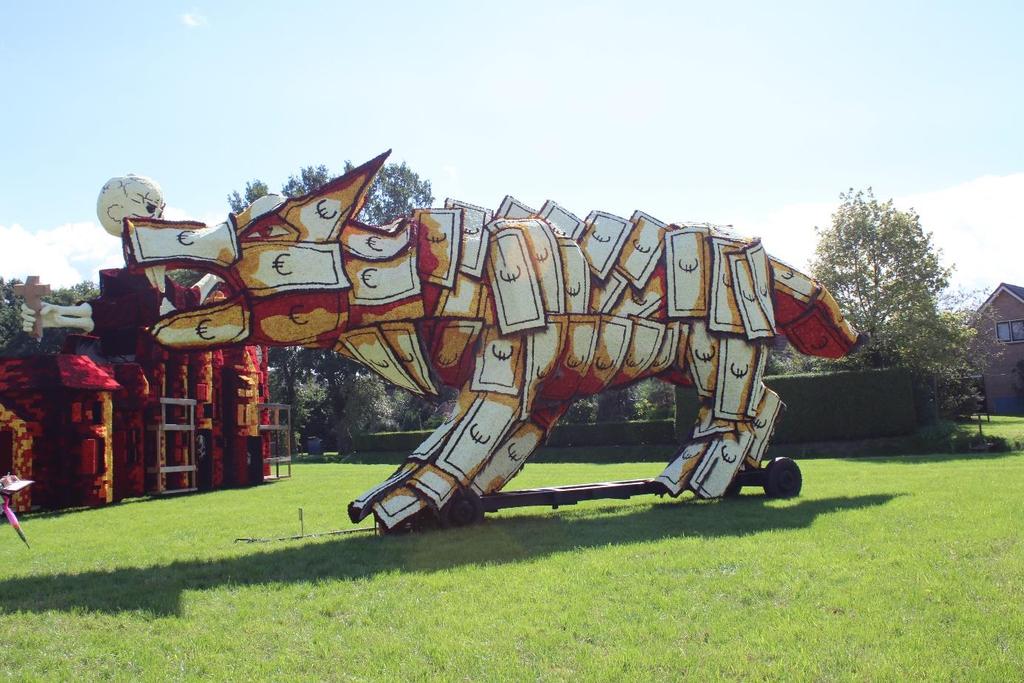 9. De Toekomst De GELDWOLF De anatomie klopte. Grappig om zo geld en wolf te verbinden. Het plakwerk is strak leuke aanvulling met riet. De voorzijde van de wagen als eerste indruk was niet sterk.